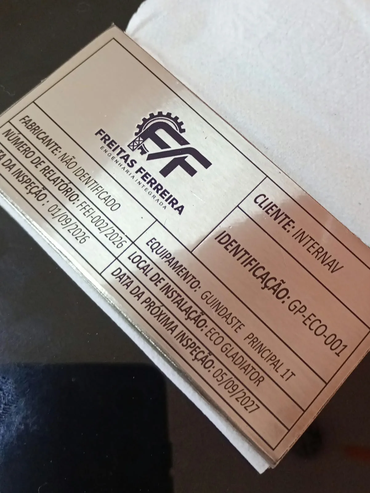 Plaqueta de inspeção com logo Freitas Ferreira